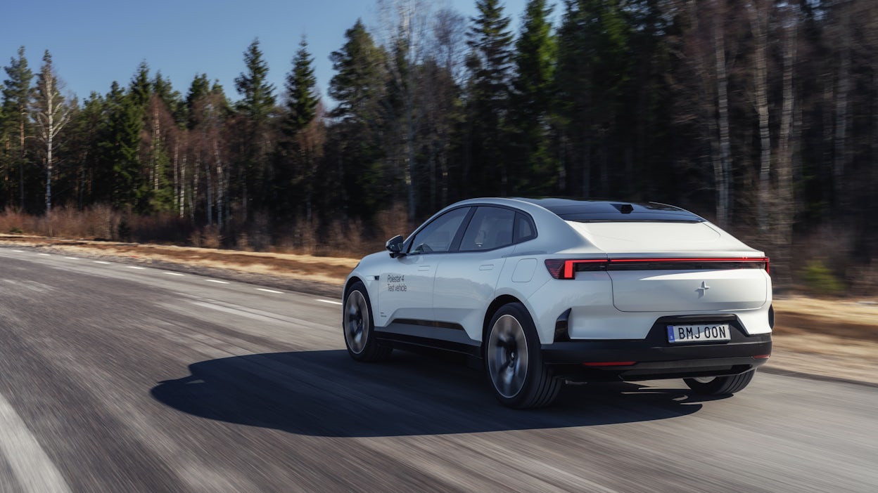 Rear of Polestar 4 driving on track