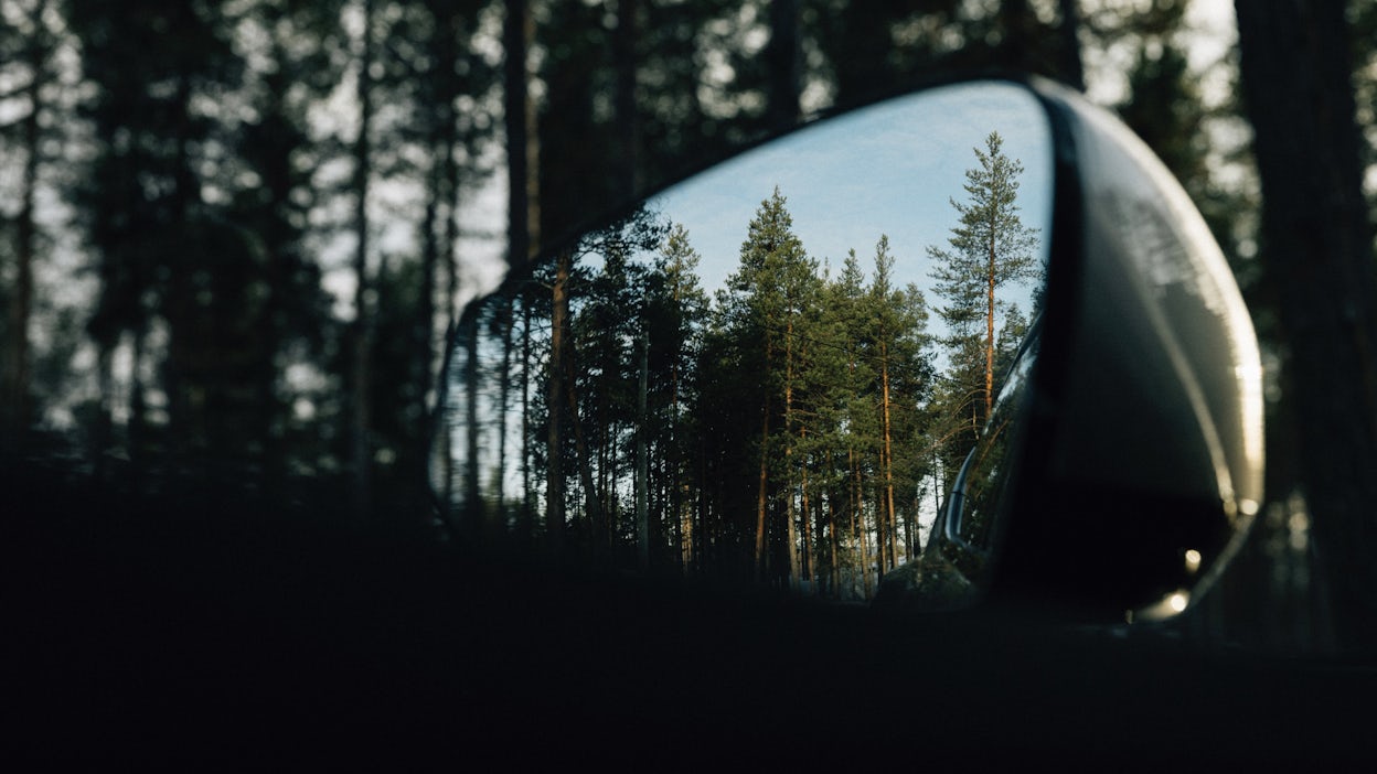 Looking out the side mirror.