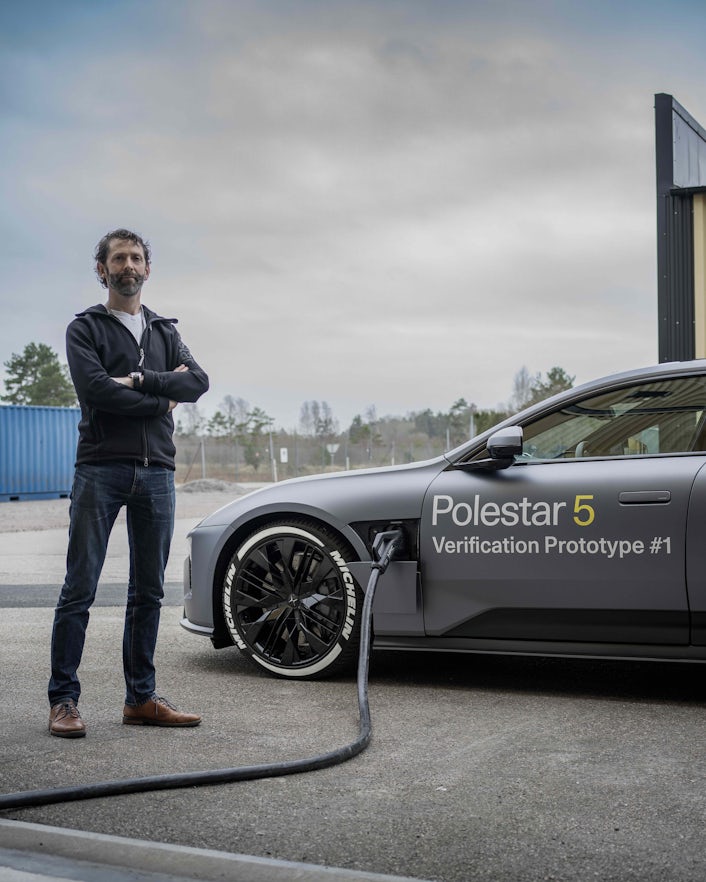 Engineer stands in front of Polestar 5