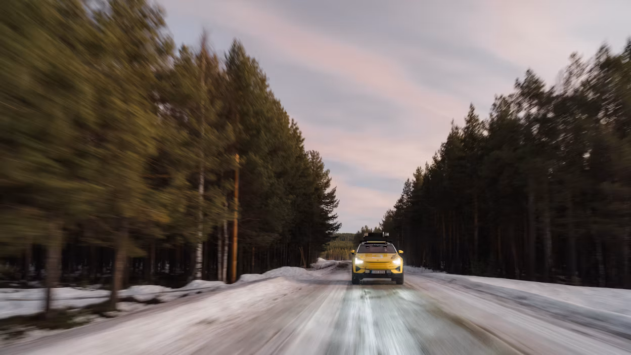 A car driving on snowy road