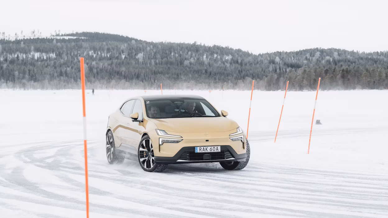 Polestar 4 slides around a frozen ice track corner