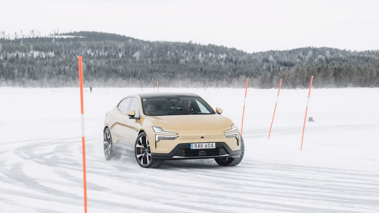 Polestar 4 slides around a frozen ice track corner