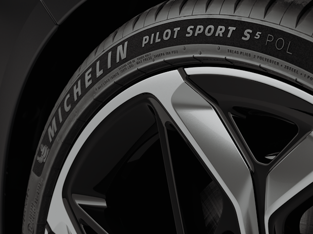 Close-up of a Michelin Pilot Sport S5 tire and alloy wheel on a Polestar car.