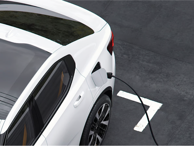 Polestar car charging at a parking space.