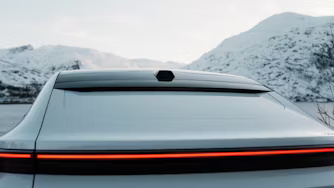 Back of Polestar 4 in front of mountains
