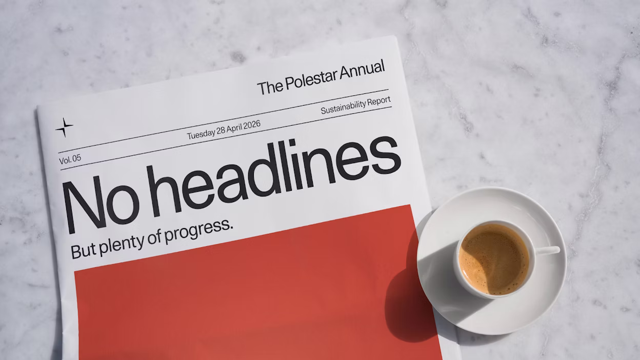 Newspaper on table with coffee cup