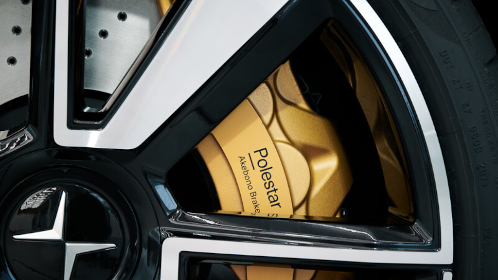 Golden brake labeled Polestar Akebono Brake