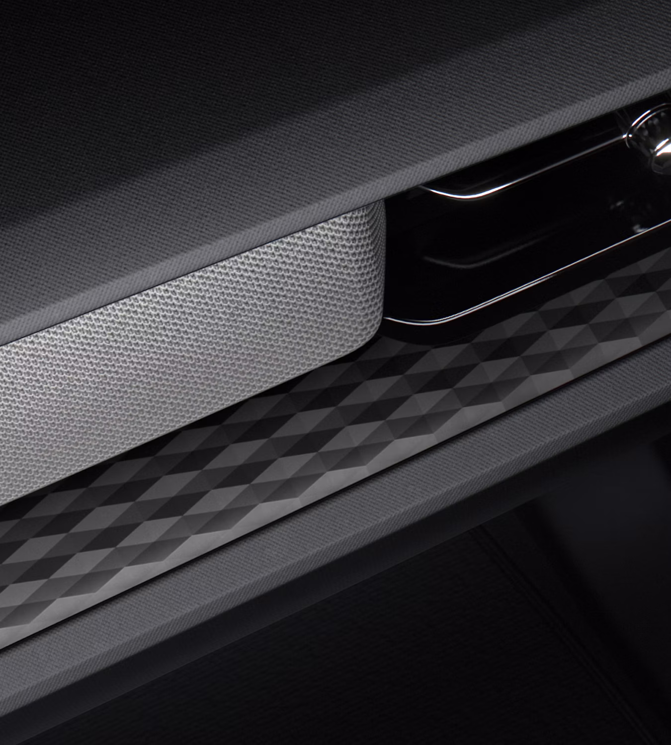 Polestar 2’s 3D etched deco illuminated with interior lighting.