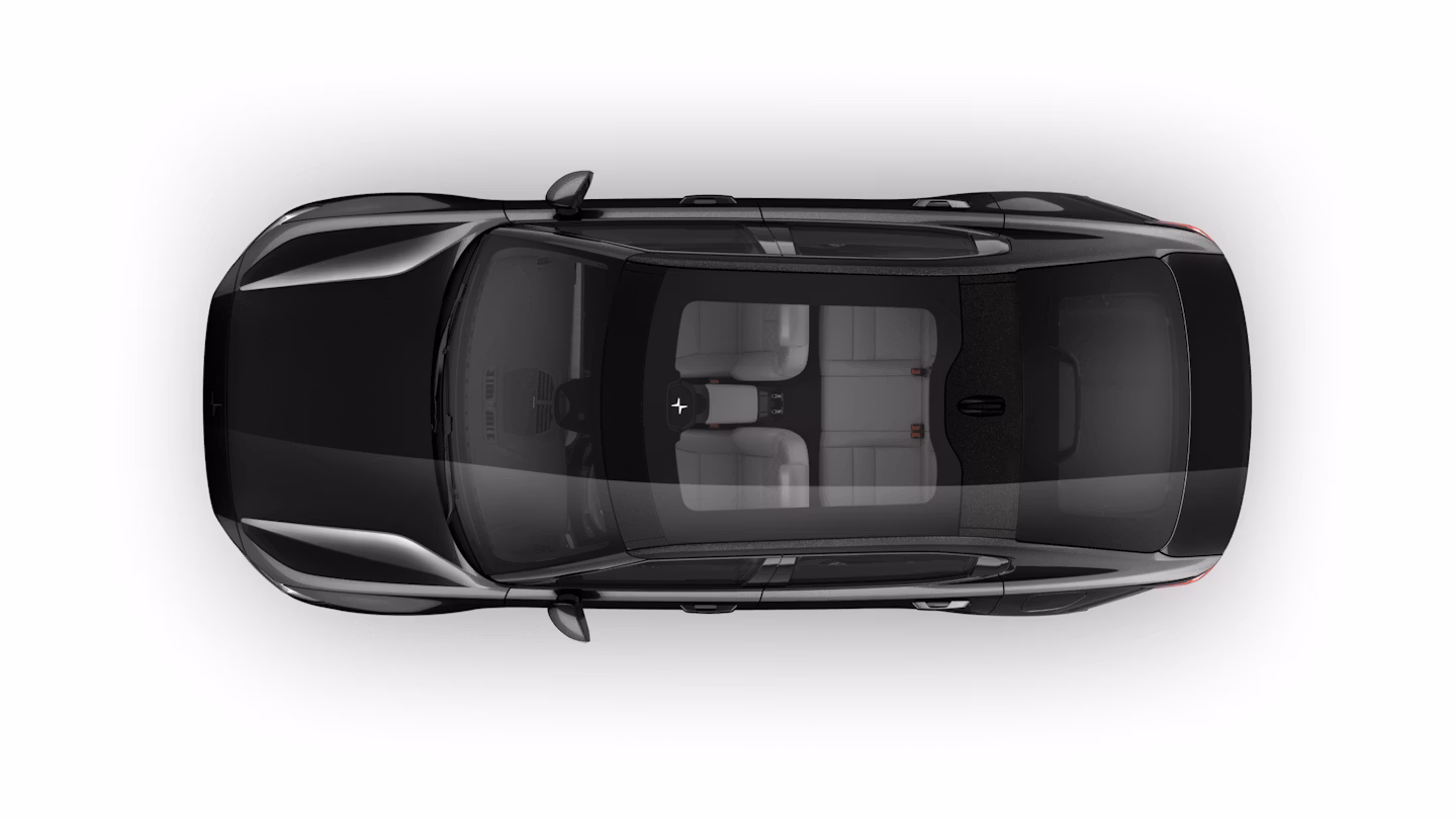 A bird’s eye view of Polestar 2 in Space colour with the panoramic roof.
