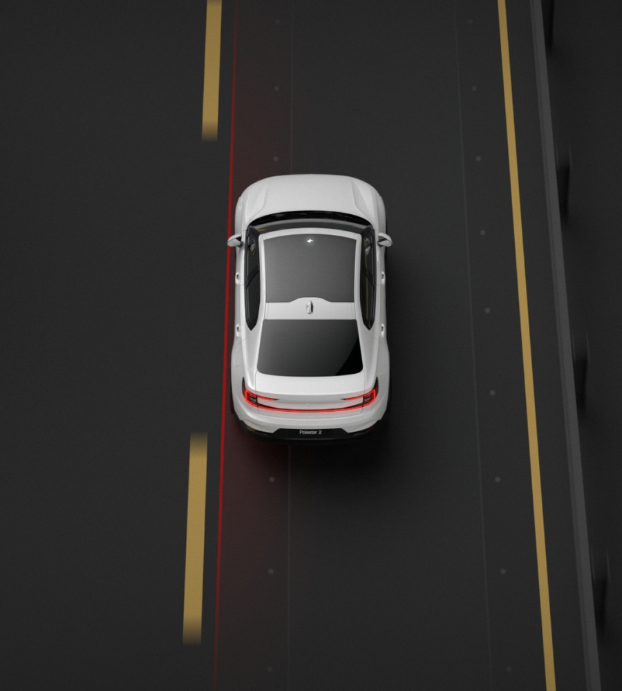 Polestar 2 steering back to its current lane after an attempted lane change without indication.