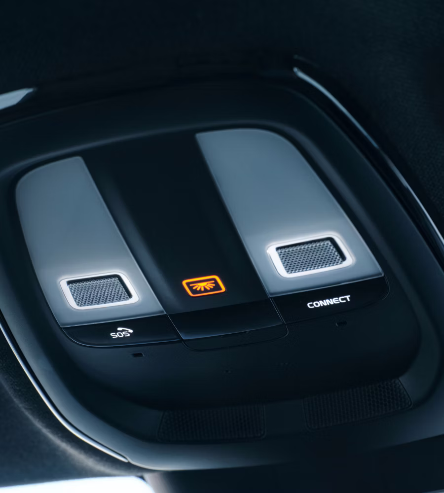 Polestar 2’s overhead console with the SOS and connect buttons.