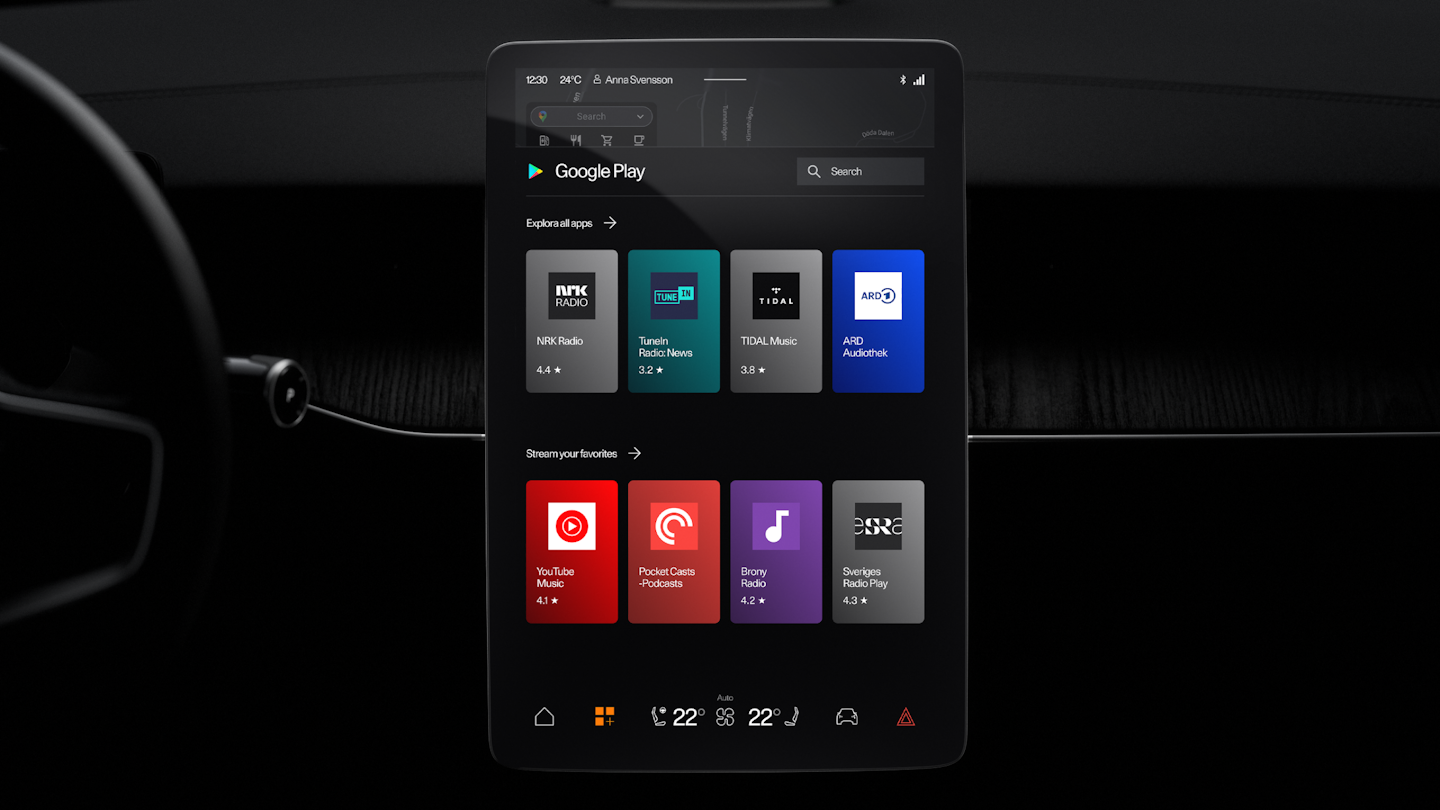Polestar 3’s steering wheel, dashboard, and centre display showing the Google Play Store screen.