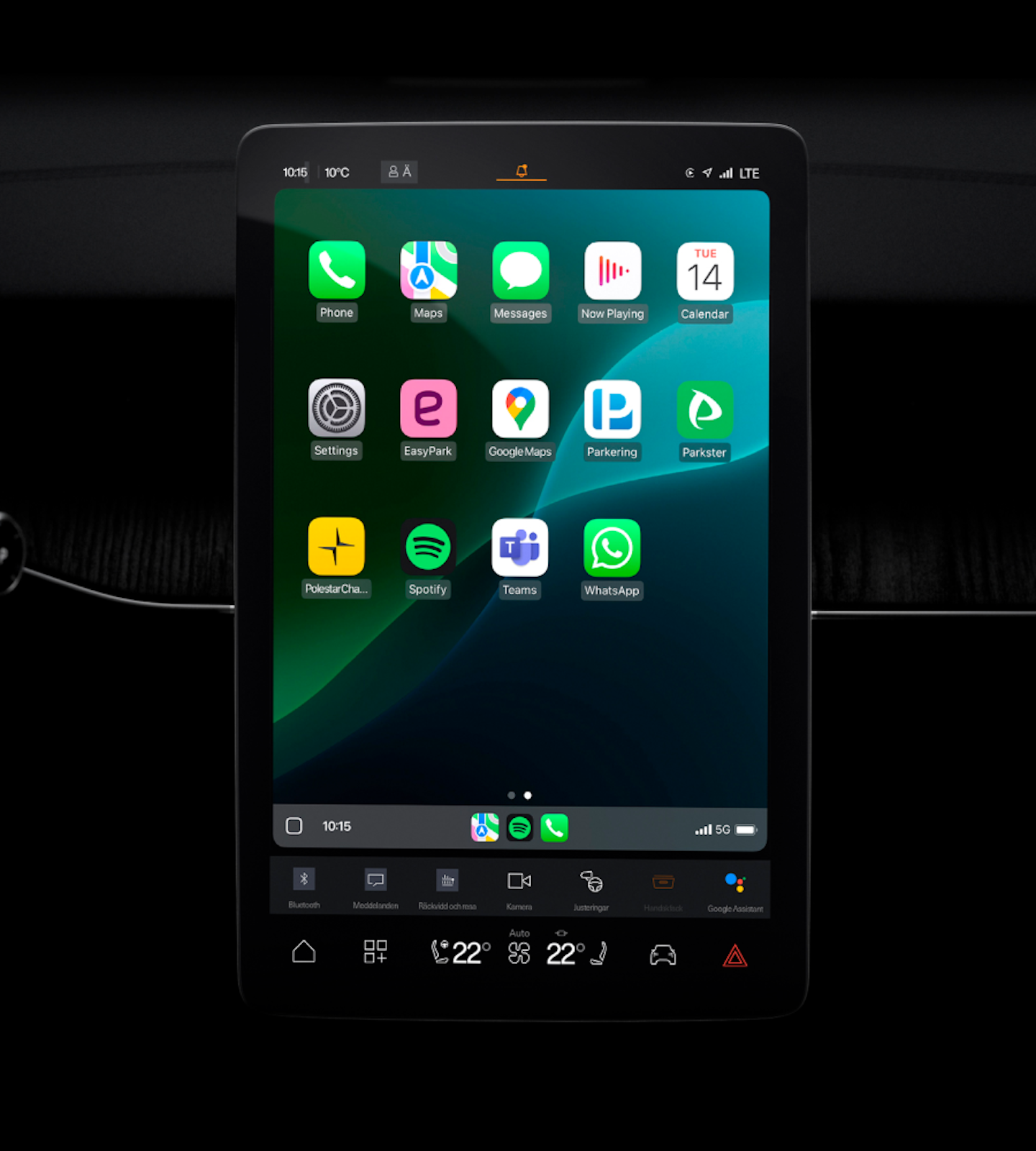 Polestar 3’s centre display showing the Appple CarPlay home screen with a green background.