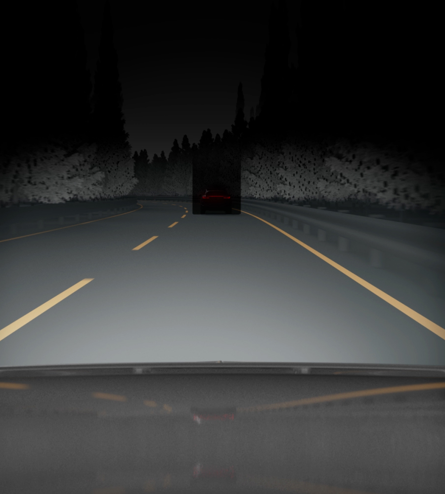 Polestar 3 on the motorway with headlights automatically dimming to individually detected cars.