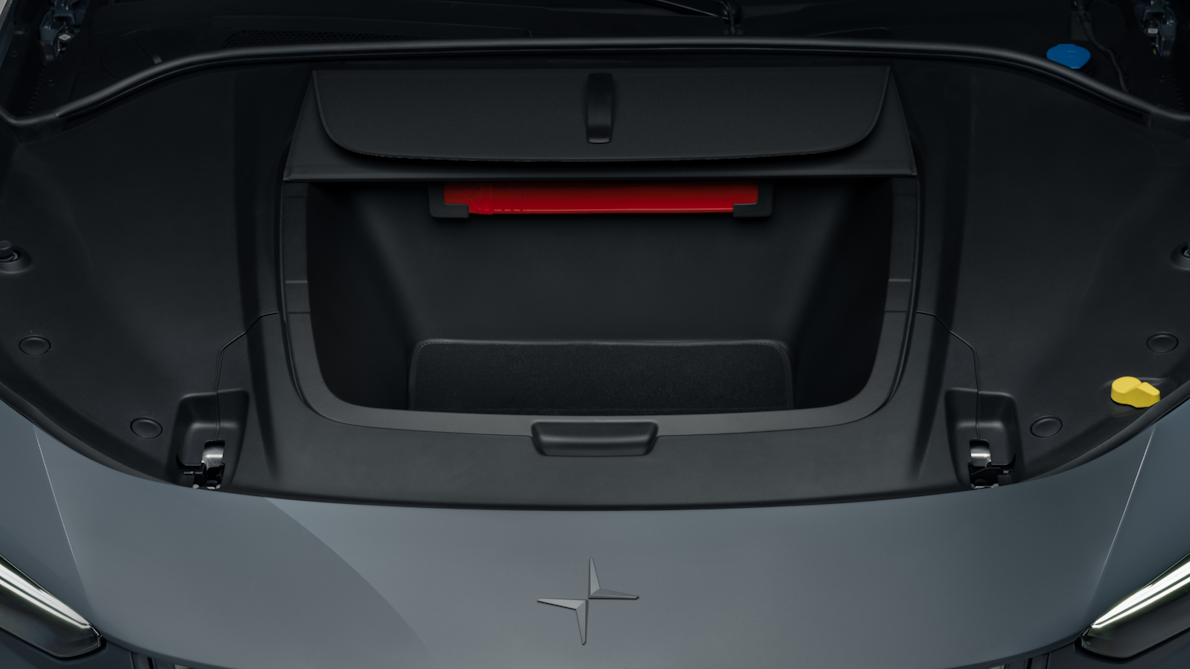 Polestar 3’s hood open showing the front storage compartment behind the Polestar logo.