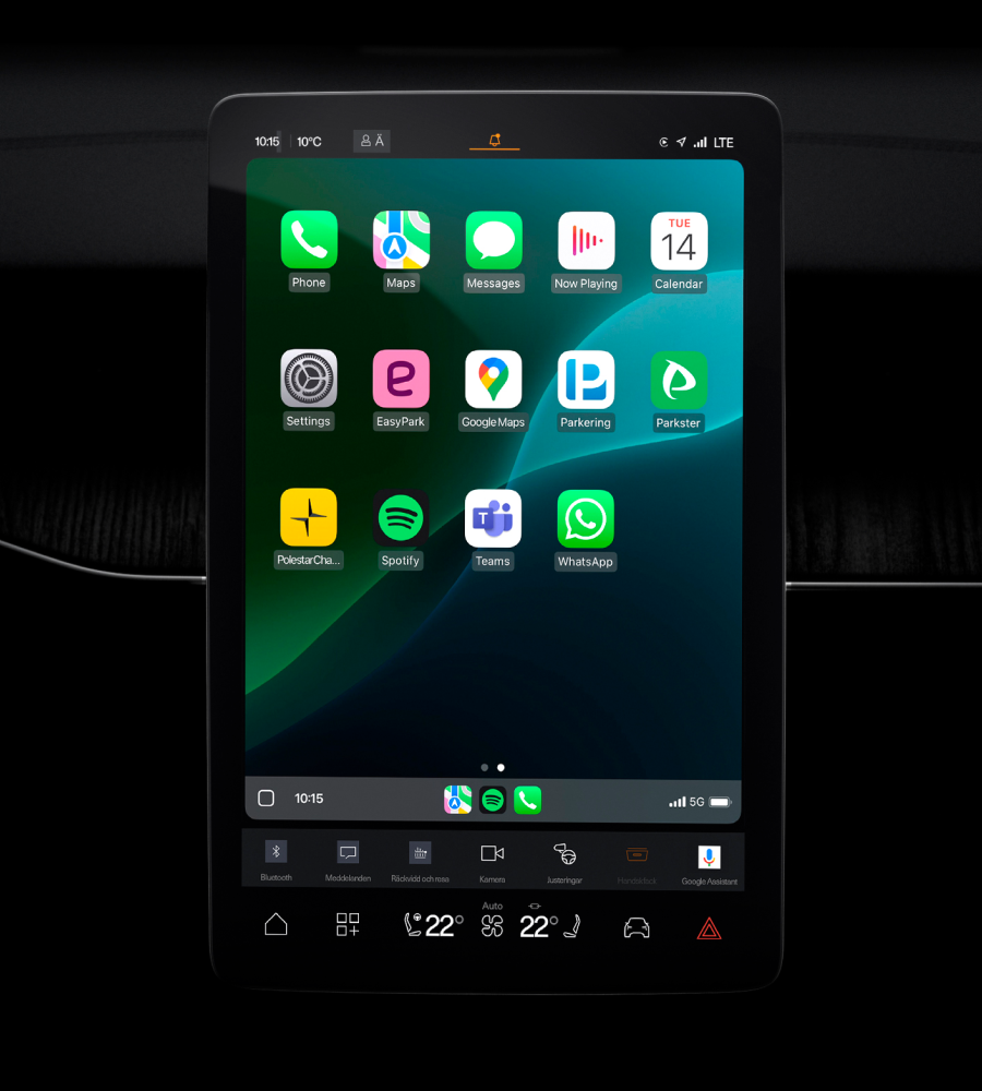 Polestar 3’s centre display showing the Appple CarPlay home screen with a green background.