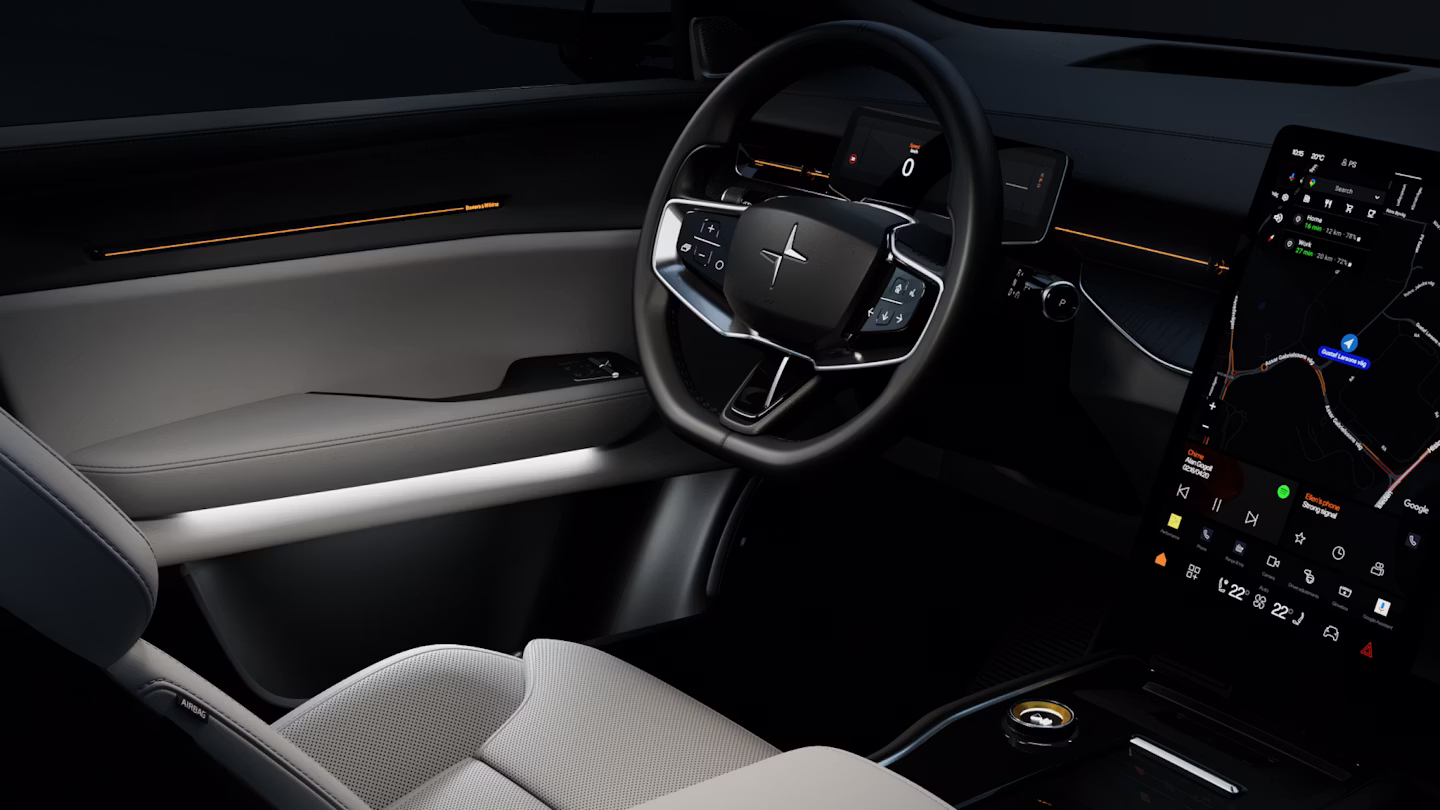 Polestar 3’s interior in a dark background lit up with its white, ambient interior lighting.