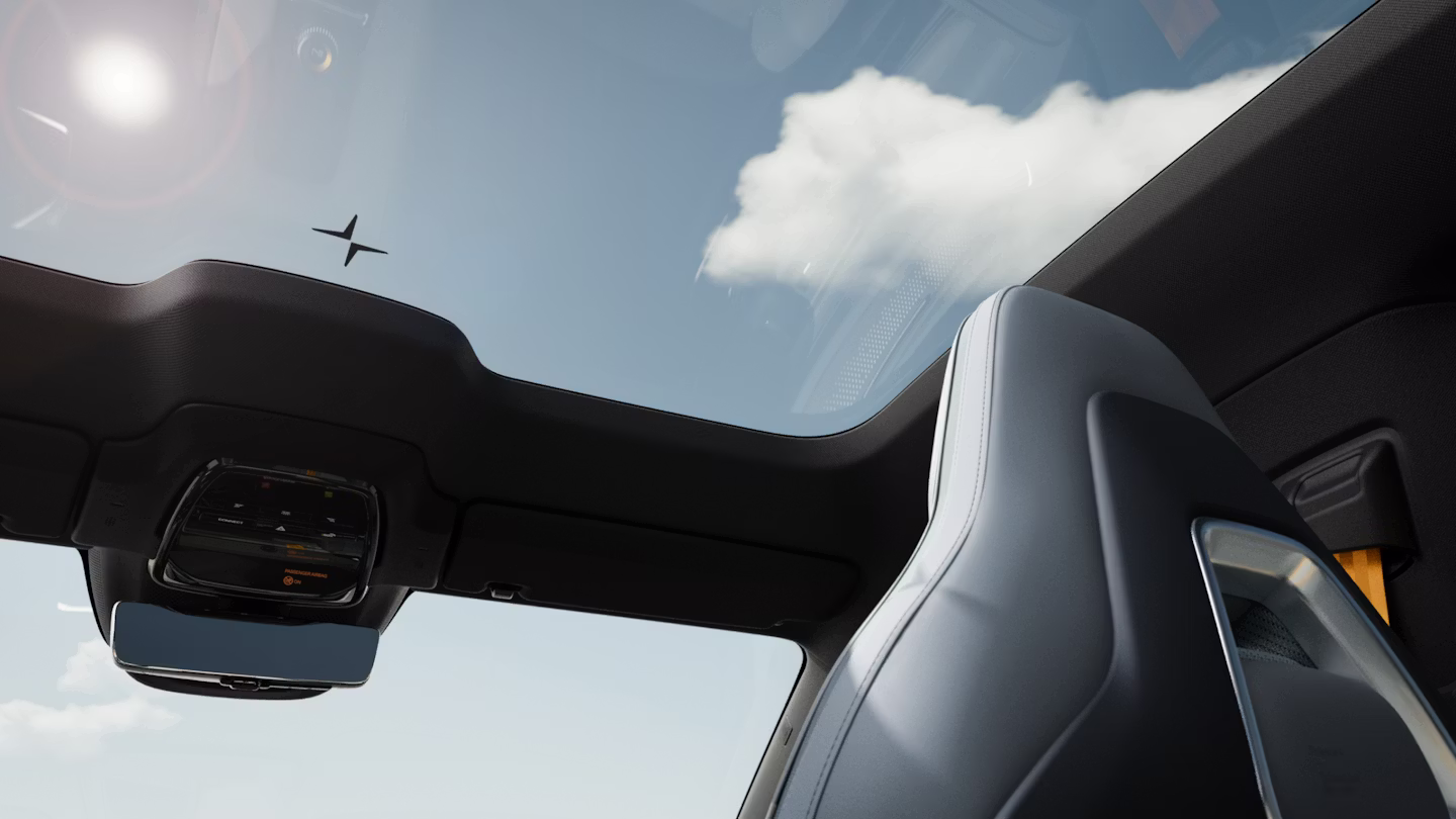 Polestar 4 coupé panoramic roof turning fully opaque under a bright sun.