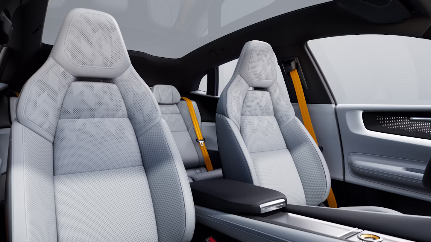 Polestar 4 coupé’s front seats in Tailored knit upholstery in Mist and Swedish gold seat belts.