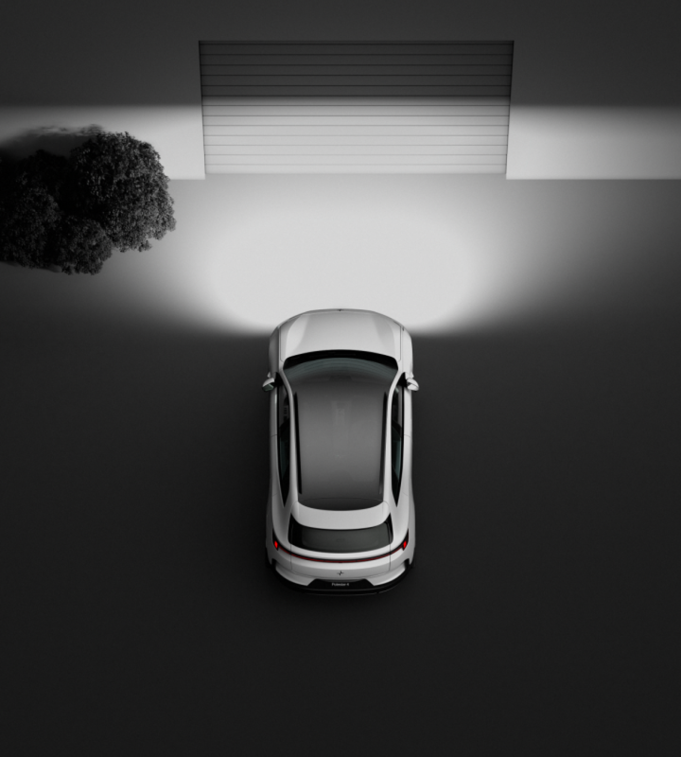 Polestar 4 SUV shining its headlights onto a closed garage door.