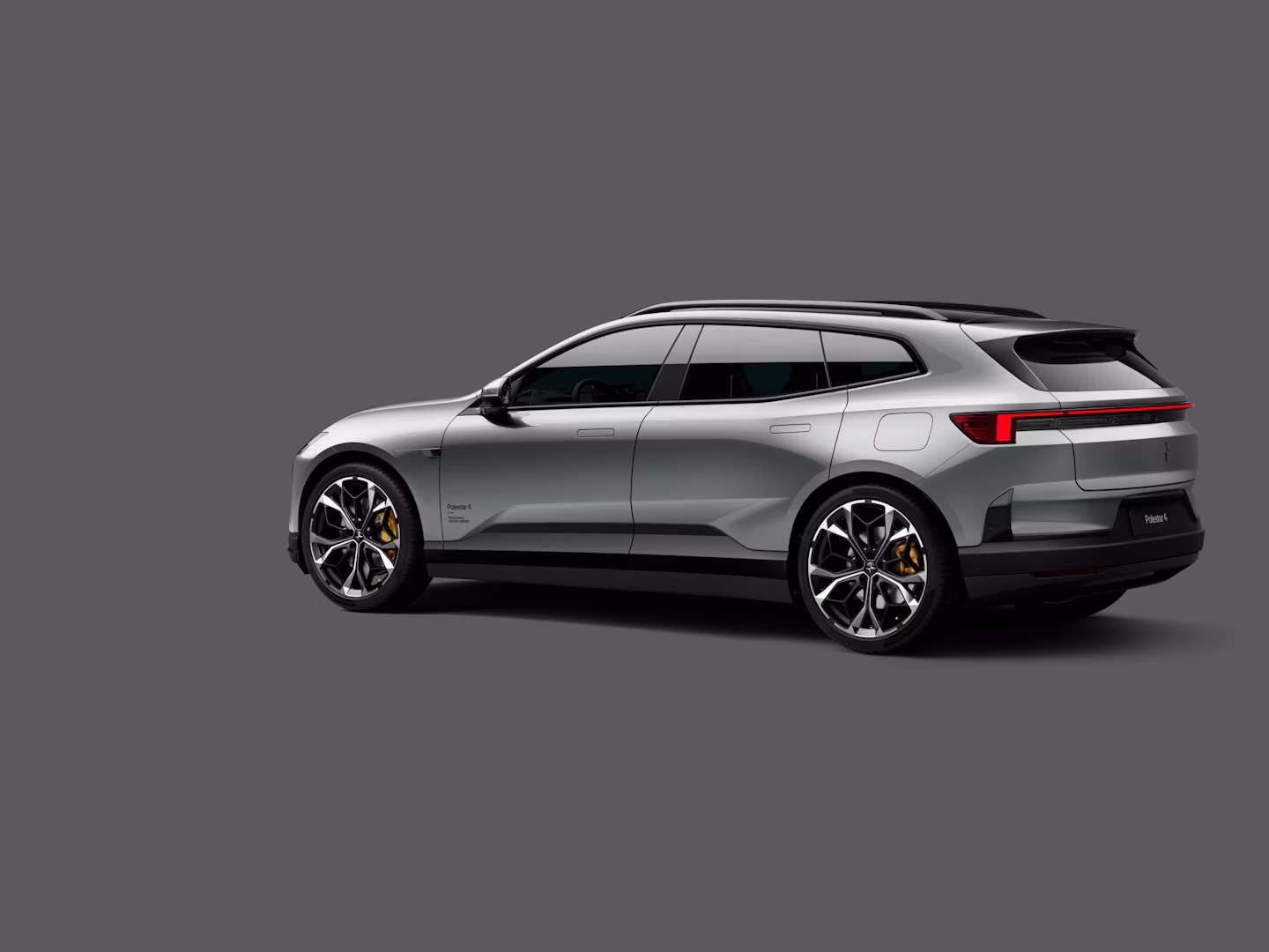 Polestar 4 SUV in color Stratus shown in rear three-quarter view on a gray background