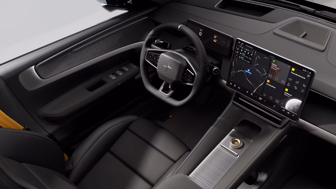 Polestar 4 SUV’s front area showing the steering wheel, dashboard, and centre display.